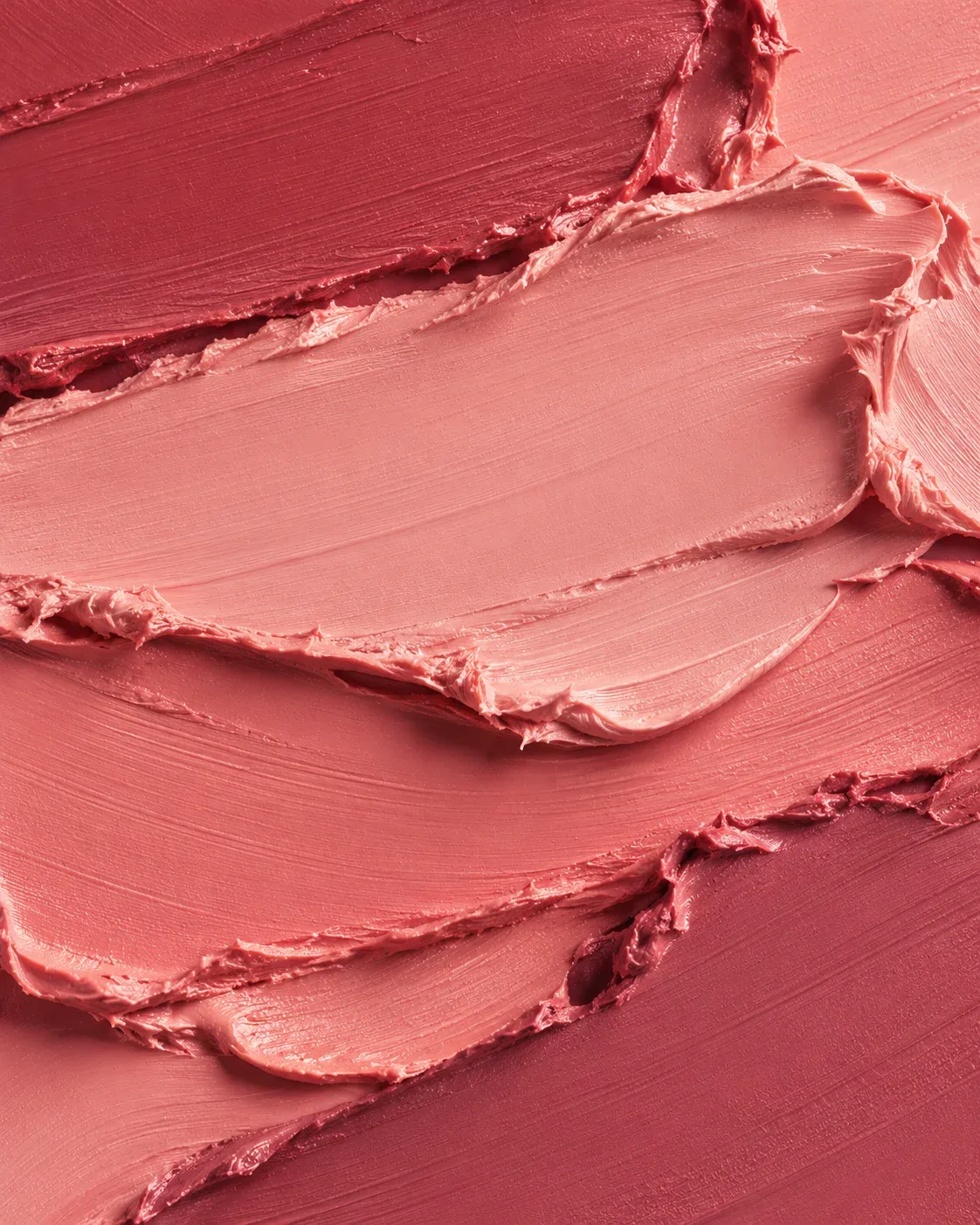 Sculptural strokes of rose-colored cream